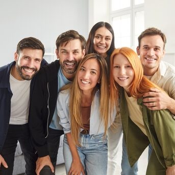 excited,smiling,people,group,posing,together,meeting,giving,hug,,happy